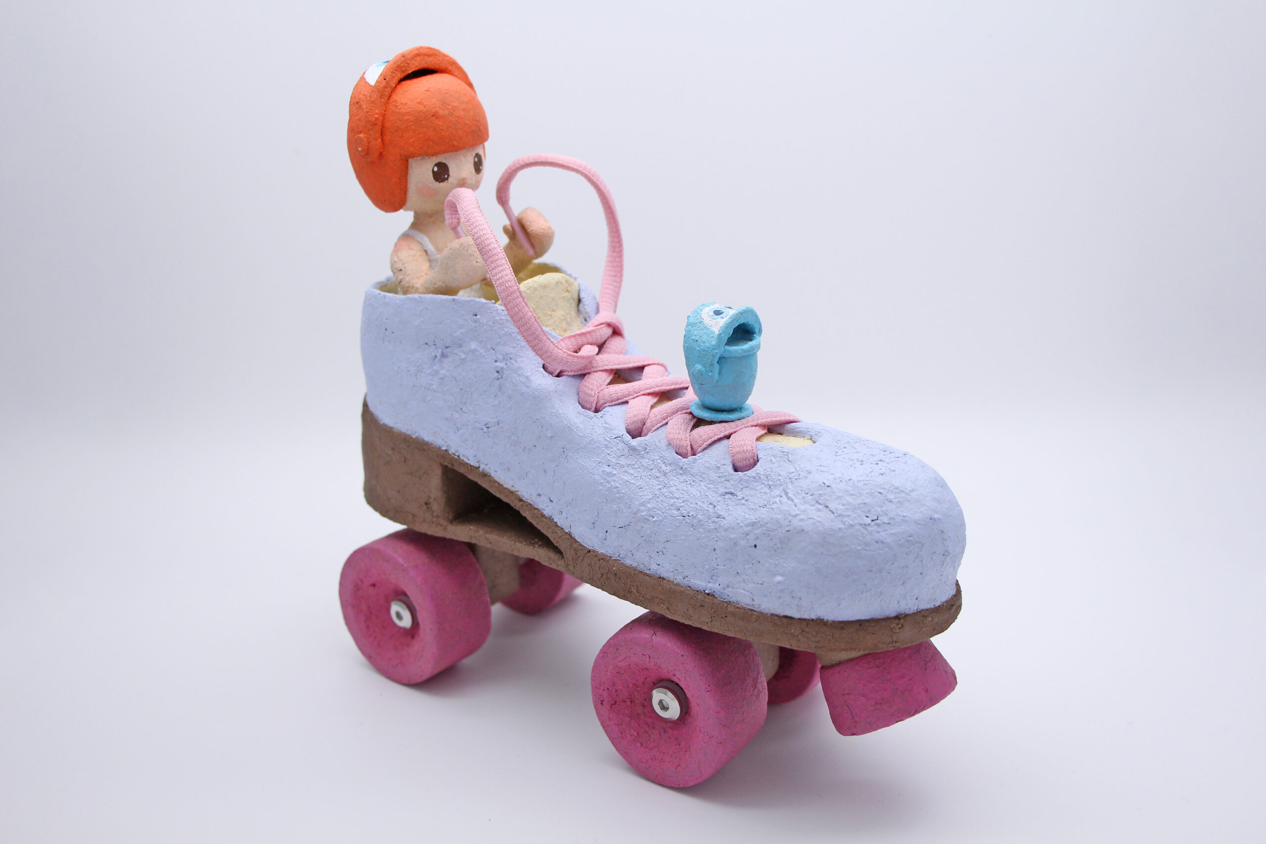 Muki Driving a Skate_ Acrylic on Ceramic_20 x 20 x 8 cm_2025